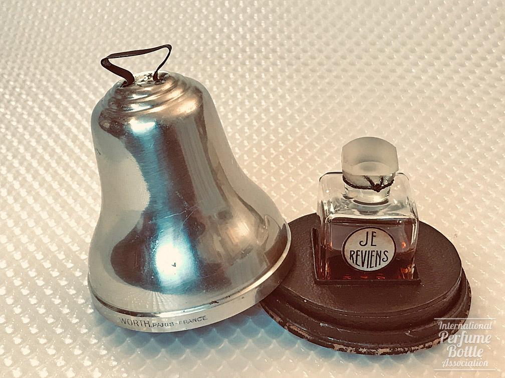 "Je Reviens" Christmas Bell Presentation by Worth