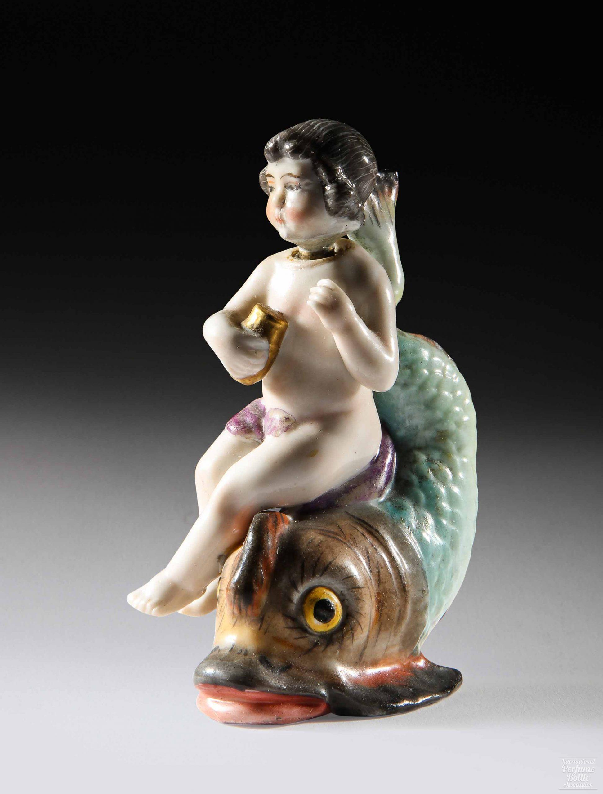 Infant Sitting on Dolphin