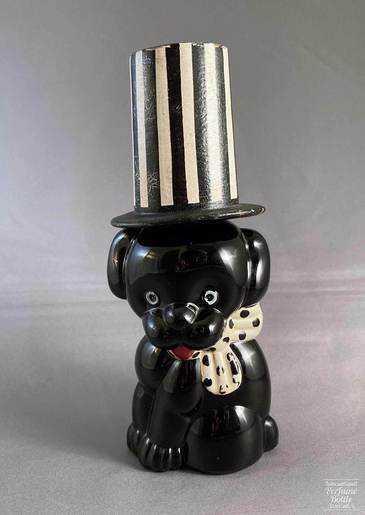 Black Puppy With Tall Hat